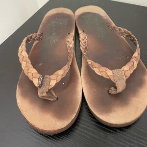 Rainbow braided flip flops